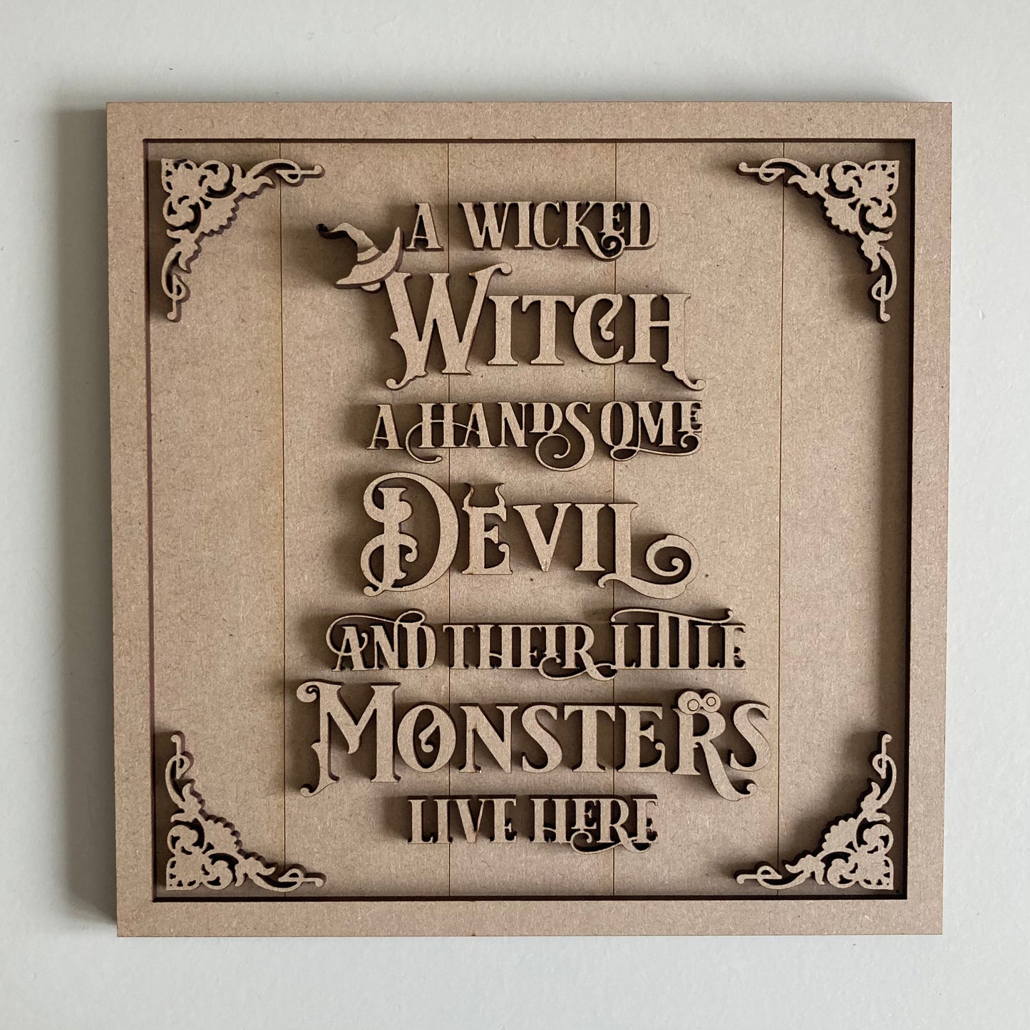 19cm A Wicked Witch A Handsome Devil And Their Little Monsters Live Here Sign
