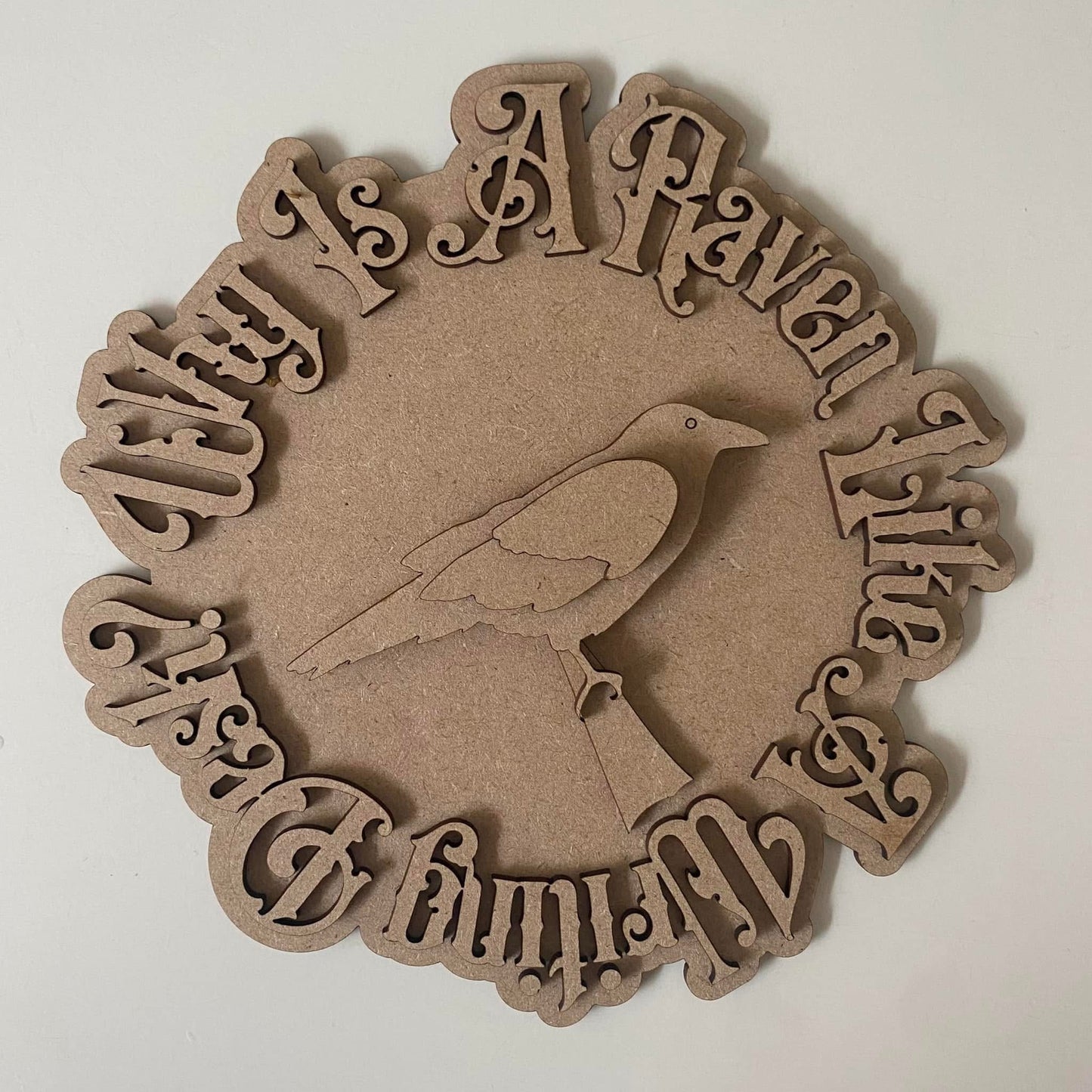 20cm Why Is A Raven Like A Writing Desk? Sign.