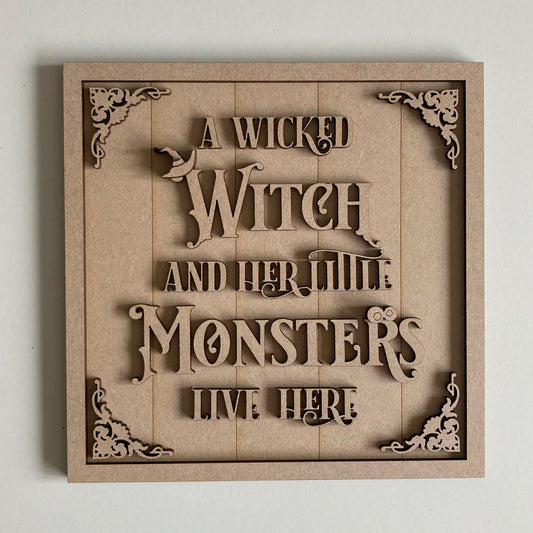 19cm A Wicked Witch And Her Little Monsters Live Here Sign